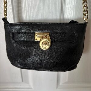 Michael Kors Black Crossbody Bag with Gold Chain Accents on Strap & Lock Design